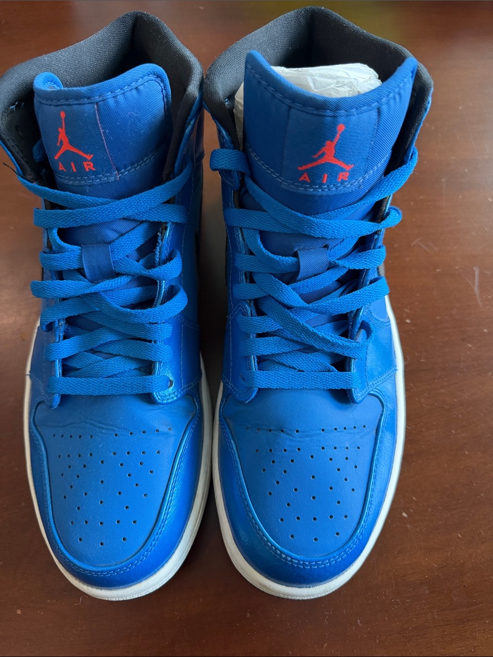 Jordan High-Top Sneakers in Royal Blue with Red Logo